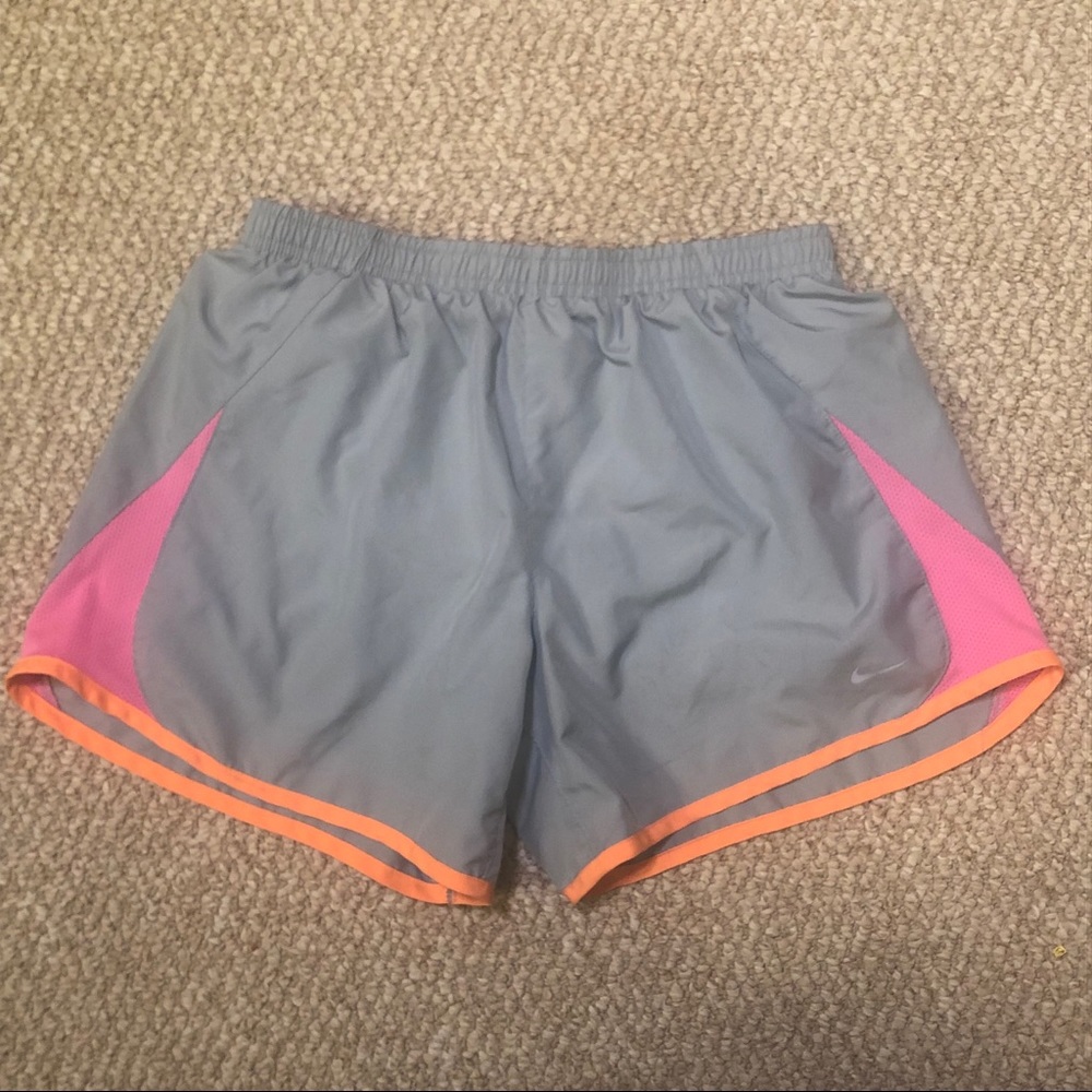 Gray pink and orange girl’s Nike running shorts